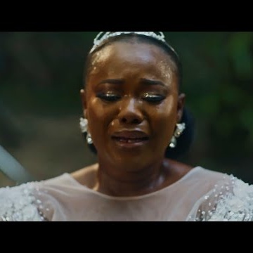 TEARFUL BRIDE DANCES WITH HER FATHER by Segun Johnson